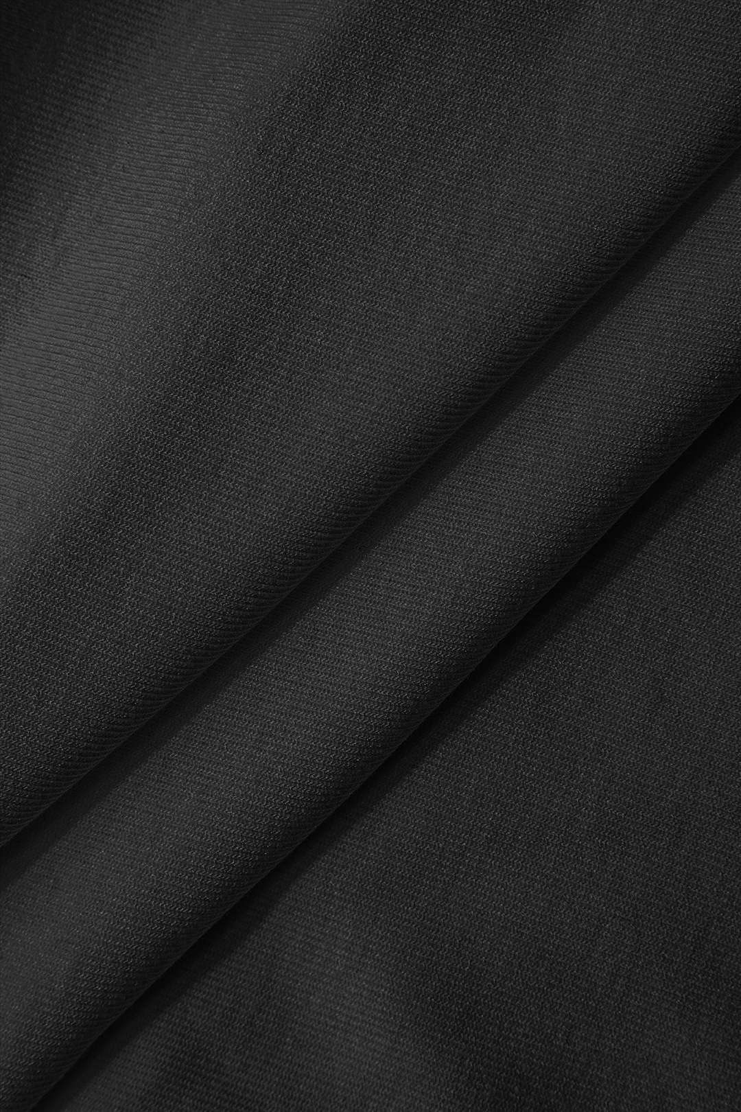 Natiné -Asymetryczny t-shirt z efektownym marszczeniem